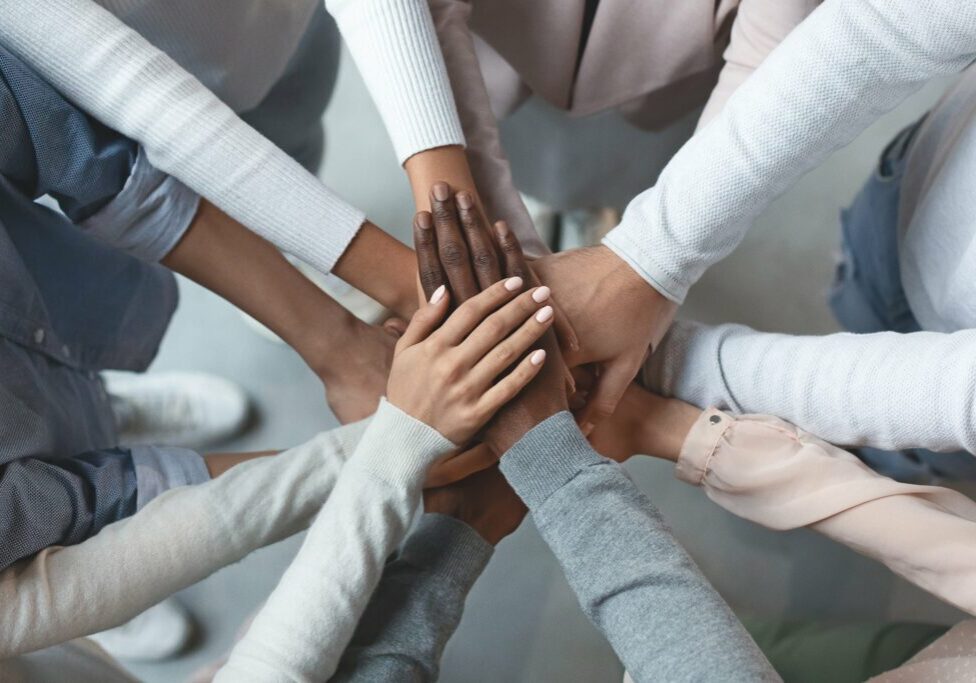 business_team_puts_all_hands_in_for_a_huddle_for_unity_teamwork_team_spirit_trust_diversity_inclusion_by_prostock-studio_gettyimages-1201215883_2400x1600-100859605-orig-2 business_team_puts_all_hands_in_for_a_huddle_for_unity_teamwork_team_spirit_trust_diversity_inclusion_by_prostock-studio_gettyimages-1201215883_2400x1600-100859605-orig-2